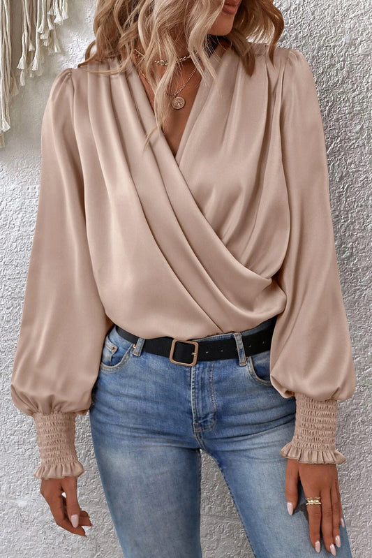 Apricot Draped Long Sleeve Wrap Dressy BlouseMaterial:100%Polyester



		The wrap design adds a chic and fashionable element to the blouse. 
	
	
		It features a V-neckline and a self-tie closure at the sid