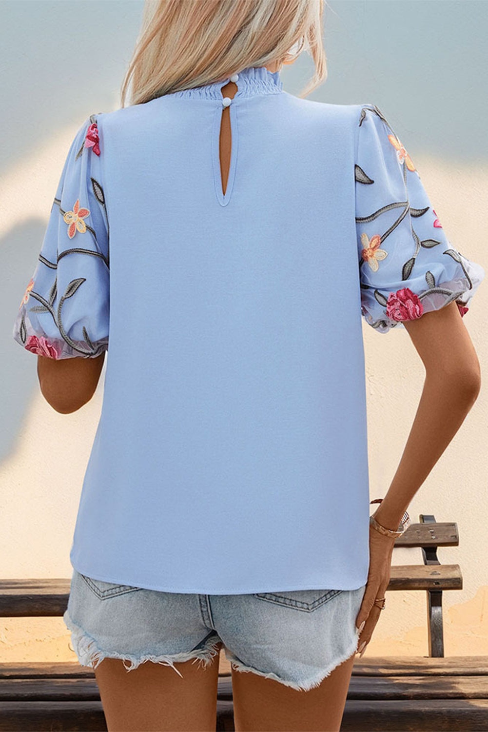 Sky Blue Mesh Floral Puff Sleeve Frill Neck Blouse• The delicate floral pattern adds a touch of femininity to the trendy mesh fabric.
• Stand out in the crowd with the unique ruffle neck design that gives a chic an