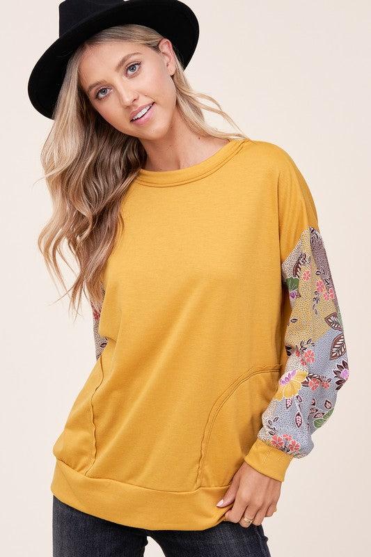 WOVEN FLORAL MIXED TOPFRENCH TERRY SOLID AND WOVEN FLORAL PRINT MIXED LONG SLEEVE SIDE POCKET RAW EDGE DETAIL TOP - MADE IN U.S.A.
Style: Casual
Print / Pattern: SOLID AND WOVEN FLORAL 
F