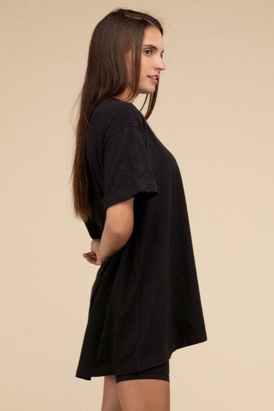 Cotton Drop Shoulder Oversized TopThe Cotton Drop Shoulder Oversized Top is a chic and comfortable addition to your wardrobe. With raw edge details adding a touch of edge, this top offers a relaxed, 