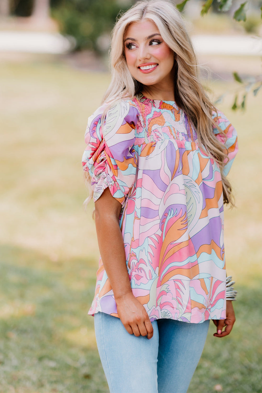 Pink Abstract Print Smocked Bubble Sleeve BlouseMaterial:100%cotton


	


		The blouse features a vibrant and unique abstract print, adding a pop of color to your outfit.
	
	
		The bubble sleeves add a play