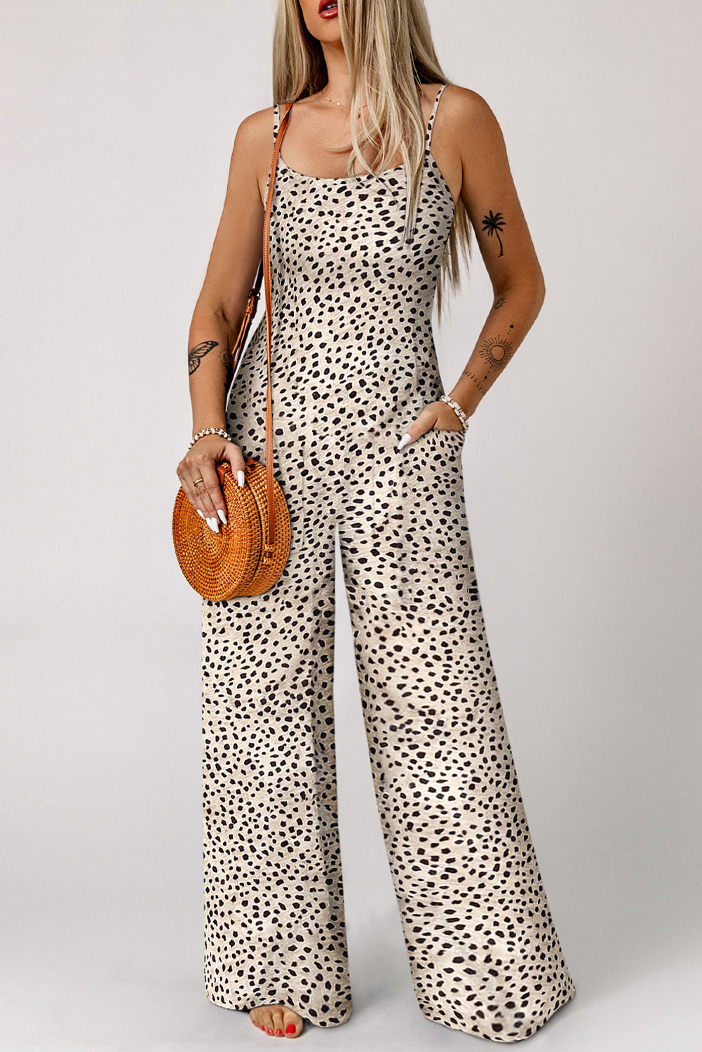 Khaki Leopard Print Spaghetti Strap U Neck Wide Leg JumpsuitMaterial:95%Polyester+5%Elastane



		•Jumpsuits can be ordered in bulk for wholesale purposes.
	
	
		•The leopard print creates a bold and daring look that wil