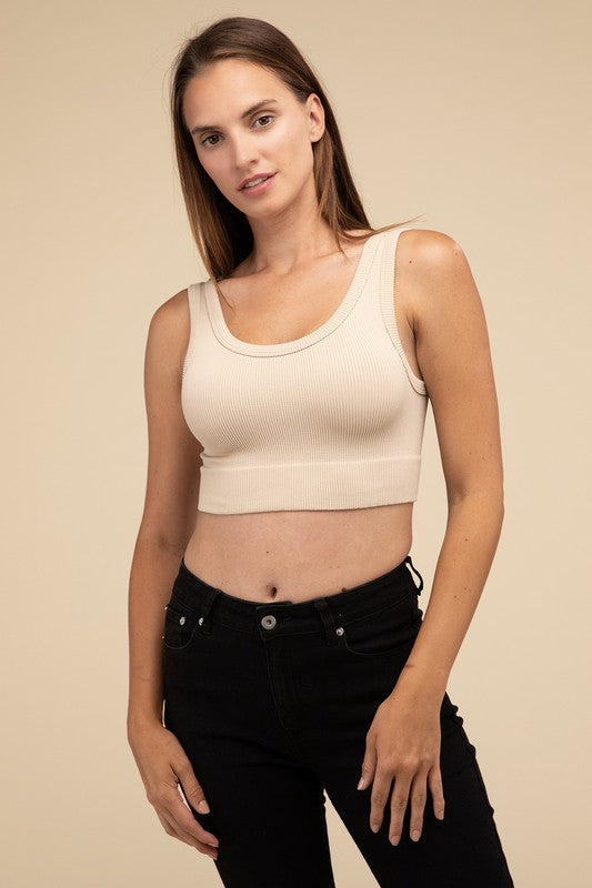 Ribbed Seamless Crop TopElevate your summer essentials with our Ribbed Seamless Crop Top, a versatile piece perfect for layering or wearing solo. Crafted with comfort in mind, it boasts a f