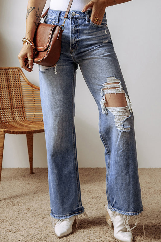 Ashleigh Blue Distressed Raw Hem Straight Leg High Waist JeansMaterial:71%Cotton+27.5%Polyester+1.5%Elastane

• The raw hem adds a touch of edge, while the high waist design offers a flattering silhouette for daily wear.
• Co