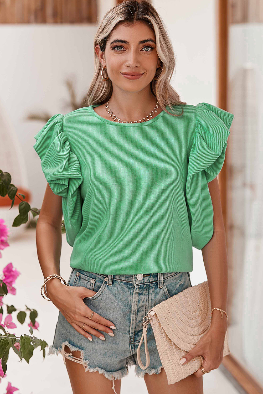 Green Solid Color Ruffle Sleeve Ribbed BlouseMaterial:65%cotton+33%polyester+2%Elastane



		The blouse features ruffle sleeves, which add a playful and romantic touch to the overall design. 
	
	
		The sol