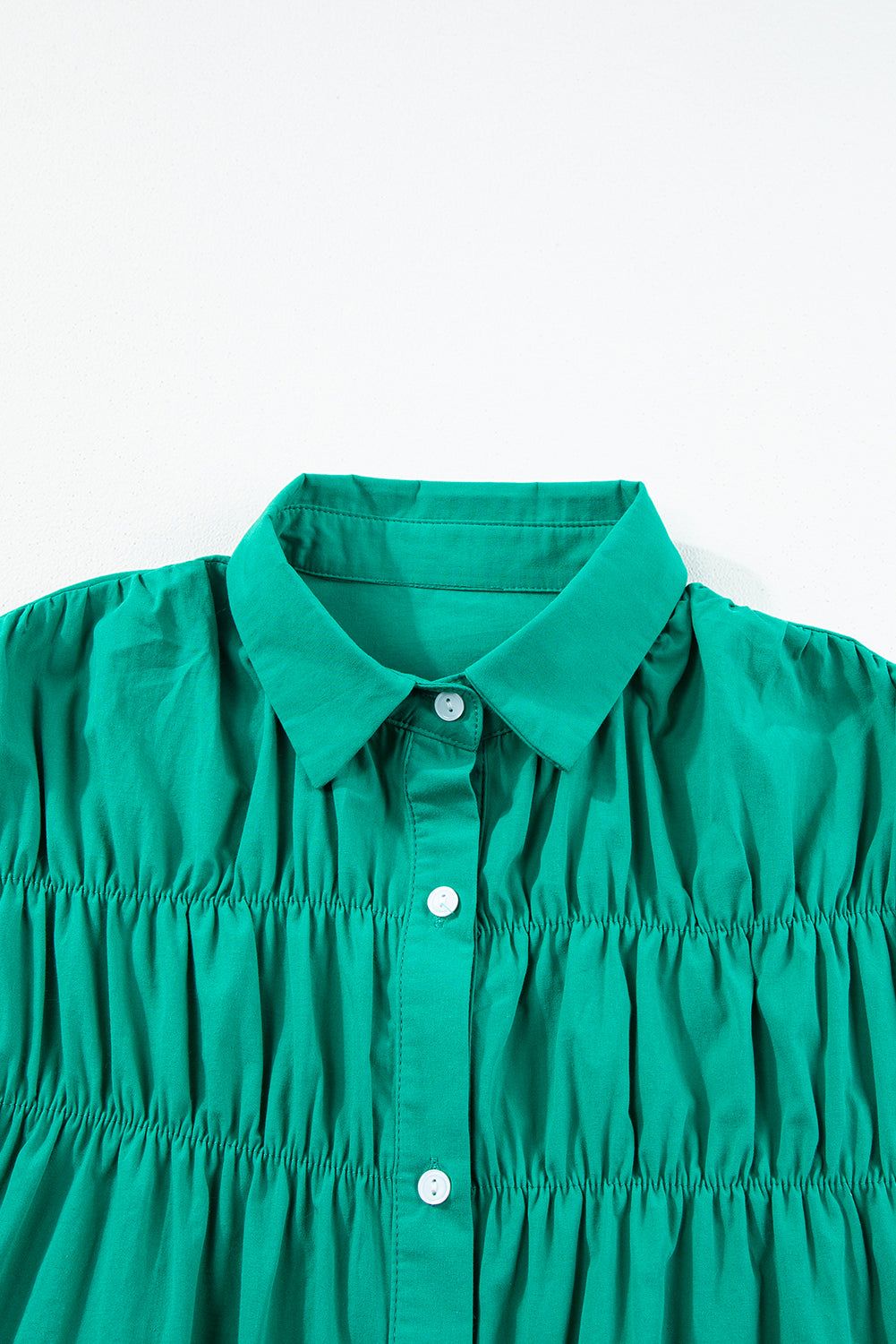 Bright Green Shirred Ruffle Sleeve Button Up Shirt DressMaterial:100%Cotton

• Elevate your casual look with the vibrant dress. Its solid color adds sophistication while the ruffle details bring a touch of playfulness.
