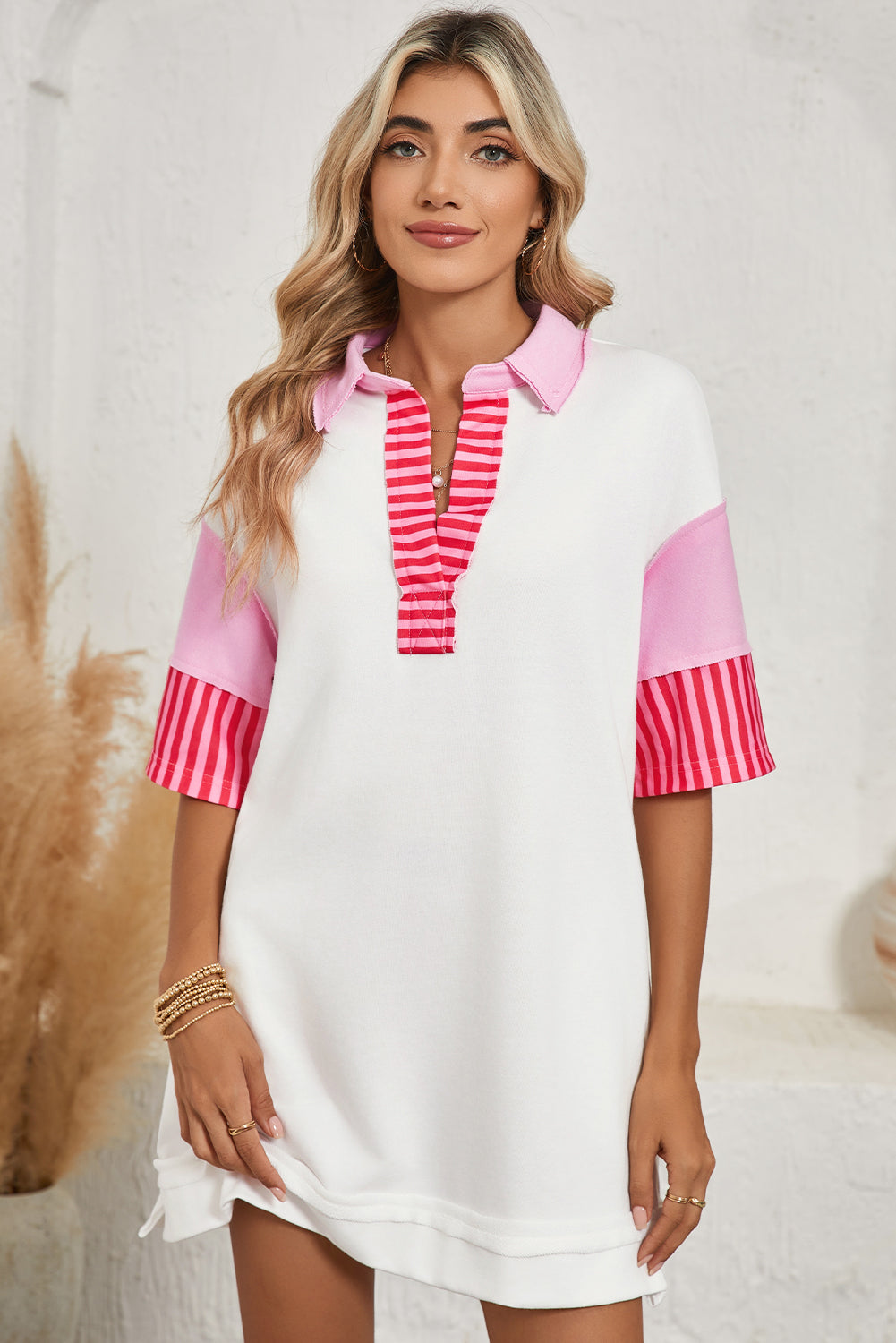 Pink Stripe Colorblock Sleeve Collared Mini DressMaterial:65%Polyester+35%Cotton

• The combination of pink and stripes adds a fun and trendy touch to your outfit.
• Embrace the relaxed vibes with the drop sleeve