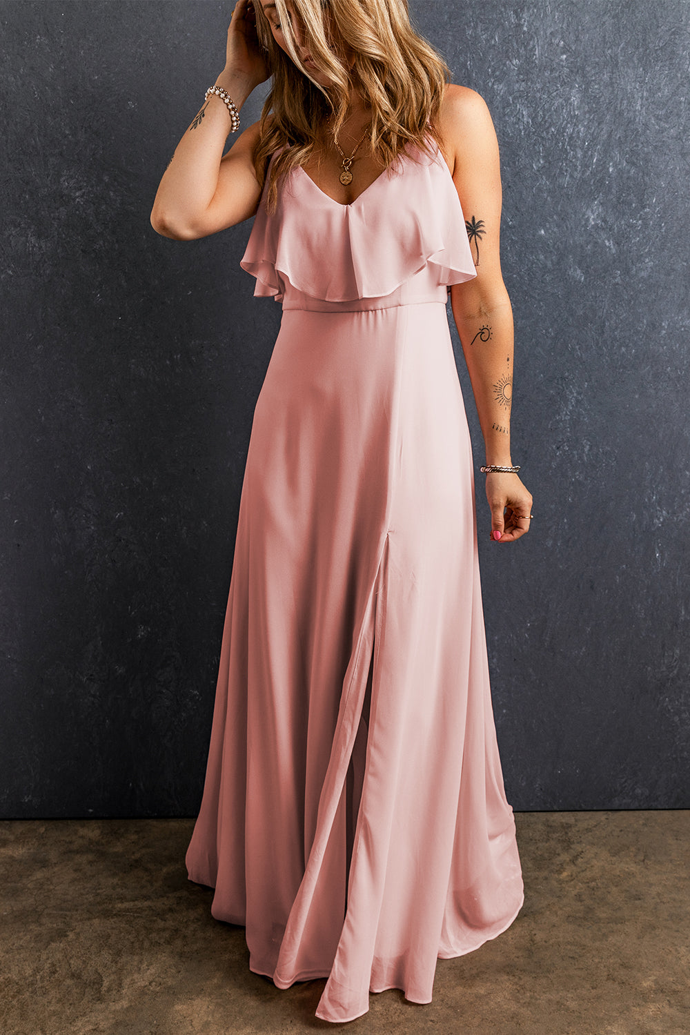 Light Pink Spaghetti Straps V Neck Ruffled Split Long DressMaterial:100%Polyester

• Effortlessly elegant, this dress features a charming ruffled design that cascades down the front.
• The flattering V-neckline and delicat