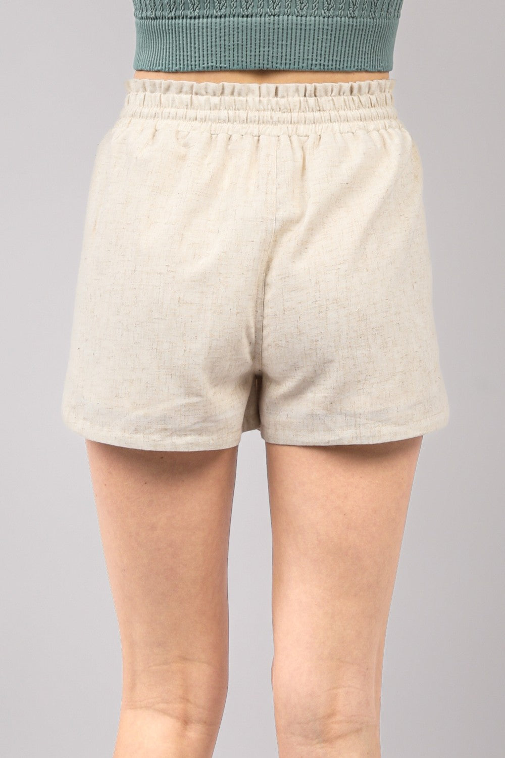 VERY J Drawstring Elastic Waist Linen ShortsStay cool and comfortable in these Elastic Waist Solid Linen Shorts featuring side pockets and a round hem for added style. These Cool Comfort Eco-Friendly Recycling