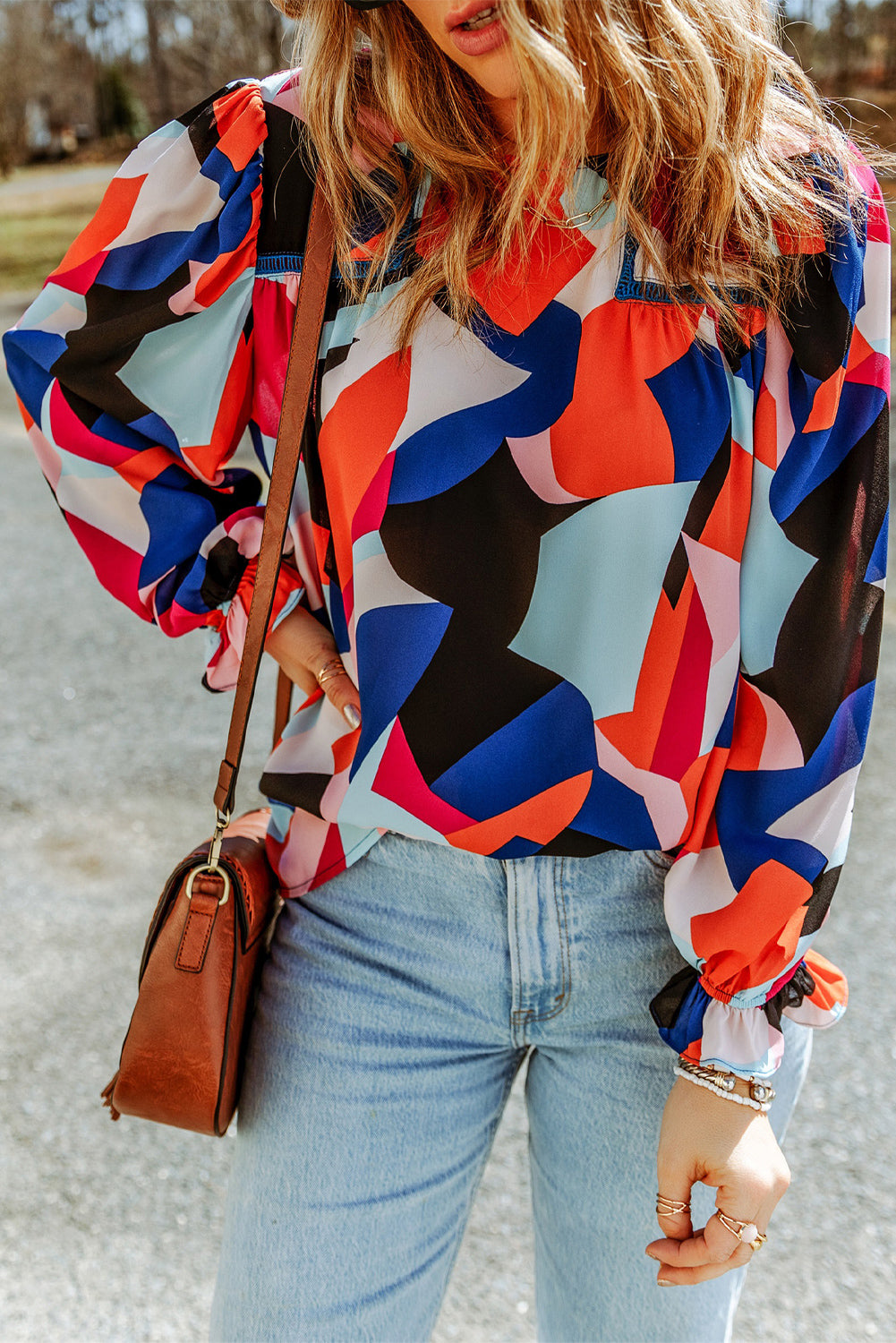 Multicolor Casual Abstract Print Puff Sleeve BlouseMaterial:100%Polyester



		•An artful abstract pattern bursts with bold color on this light and airy blouse.
	
	
		•Highlights: Relaxed fit, long sleeves with 