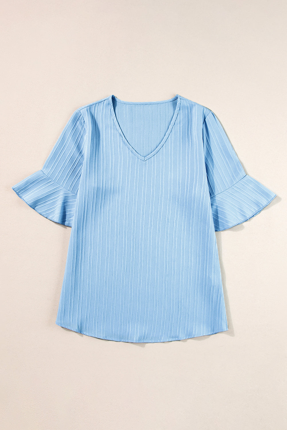 Beau Blue Ruffled Short Sleeve V Neck Textured BlouseMaterial:97%Polyester+3%Elastane



		Elevate your style with this stylish and popular women's top featuring textured fabric. 
	
	
		The V-neck, ruffled sleeves