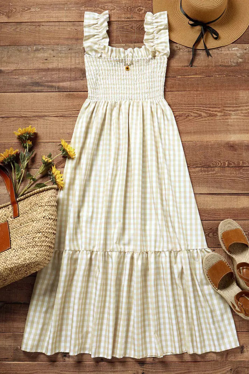 Khaki Plaid Ruffled Sleeveless Smocked Maxi DressMaterial:65%Polyester+35%Cotton



		The dress features a beautiful khaki plaid pattern, which adds a touch of elegance to the overall look. 
	
	
		It is design