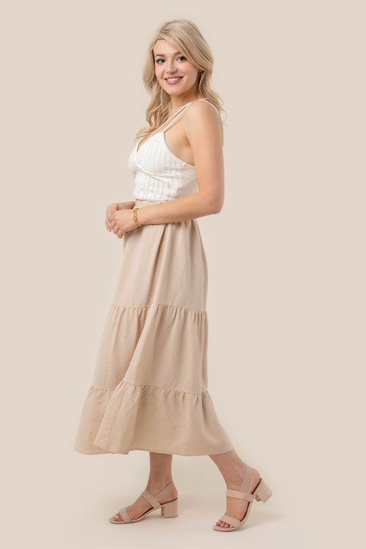 Tiered maxi skirt- Tiered maxi skirt- Pattern type : solid- Stretch : stretch- Sheer : Beige - lined and no see through / Black - not lined, but not very sheer- Care instruction : ma