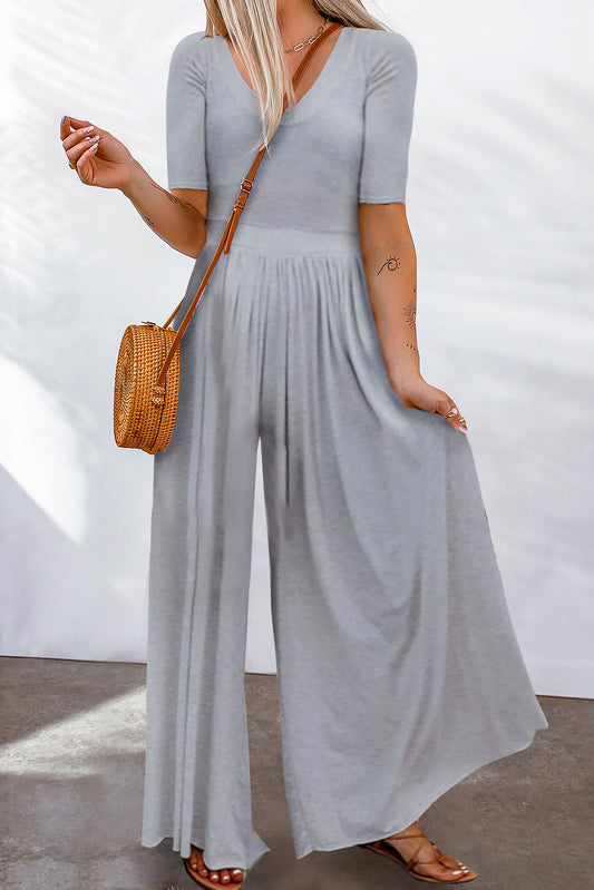 Gray Plain Basic Short Sleeve Wide Leg JumpsuitMaterial:85%Polyester+15%Elastane



		This jumpsuit is a simple and versatile piece, perfect for any casual occasion. 
	
	
		It features a plain gray color, sh