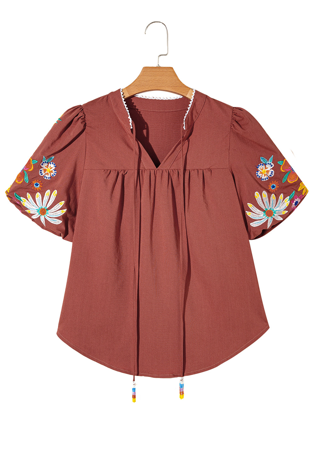 Mineral Red Floral Embroidered Puff Sleeve Split Neck BlouseMaterial:100%Cotton

• Radiate bohemian charm with the Mineral Red blouse featuring intricate floral embroidery and puff sleeves, perfect for a free-spirited look.
