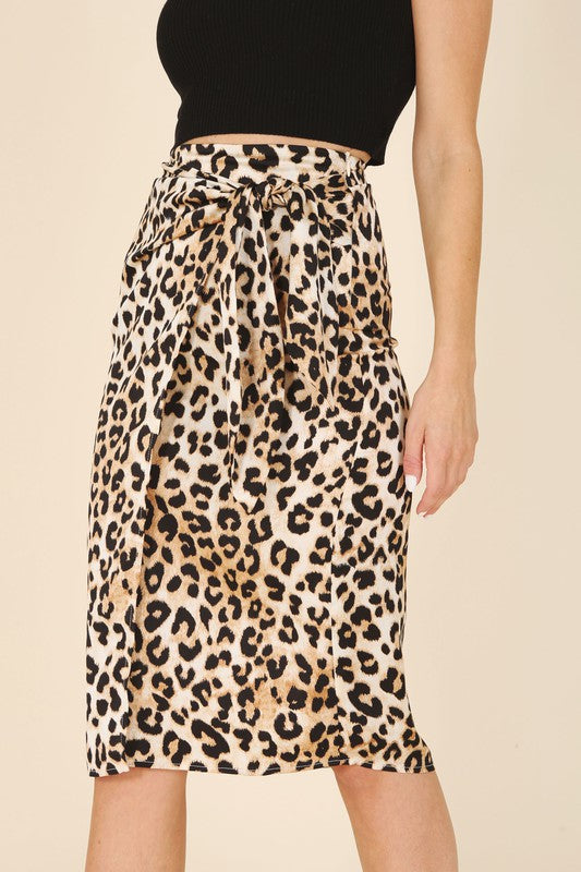 Satin leopard tie skirt- Satin leopard tie skirt- Pattern type : leopard pattern- Stretch : no stretch- Sheer : not lined, but not sheer - Care instruction : machine wash cold, only non-ch