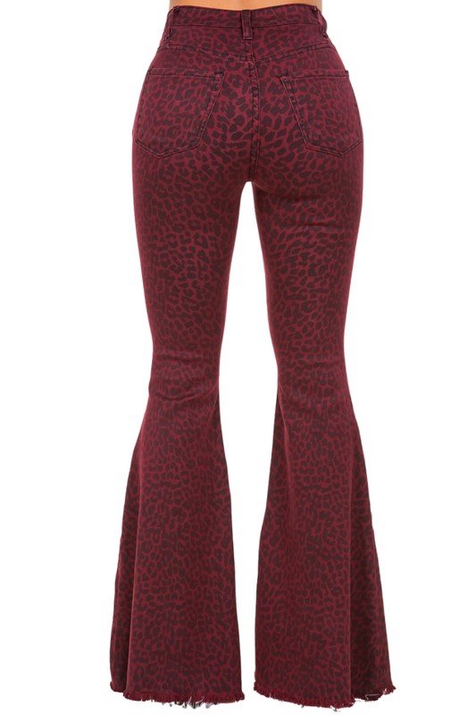 Leopard Bell Bottom Jean in BurgundyFull Length 5 pocket bell bottom jean features frayed hem, Front and back pockets, Burgundy Denim leopard Print,33.5" inseam, 10.5" Rise, Stretch Denim, Made in USAM