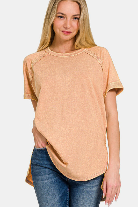 Zenana Heathered Round Neck Short Sleeve TopThe Heathered Round Neck Short Sleeve Blouse is a versatile and timeless piece that belongs in every wardrobe. With its heathered texture and round neckline, this bl