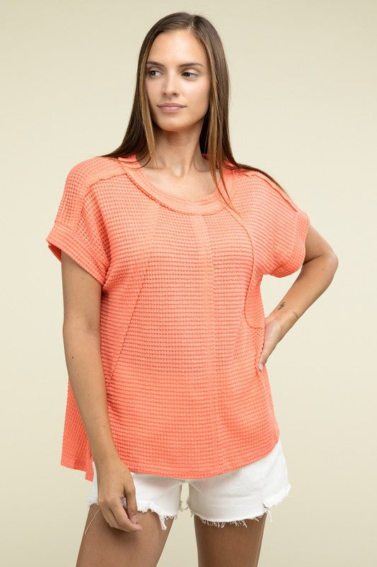 Brushed Waffle Exposed-Seam Short Sleeve TopElevate your casual wardrobe with this Brushed Waffle Top, featuring side slits, exposed seam details, and a stylish hi-low hem. Perfect for a relaxed yet trendy loo