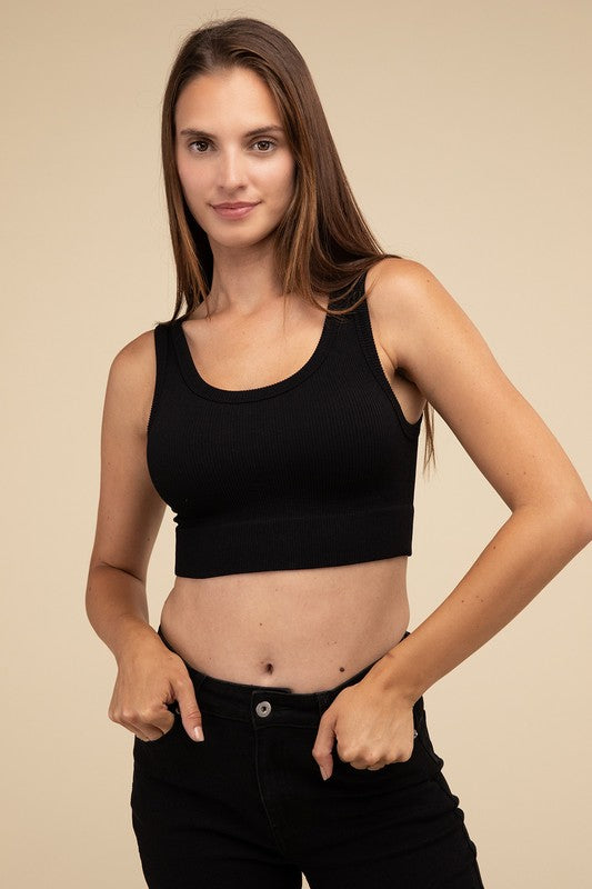 Ribbed Seamless Crop TopElevate your summer essentials with our Ribbed Seamless Crop Top, a versatile piece perfect for layering or wearing solo. Crafted with comfort in mind, it boasts a f