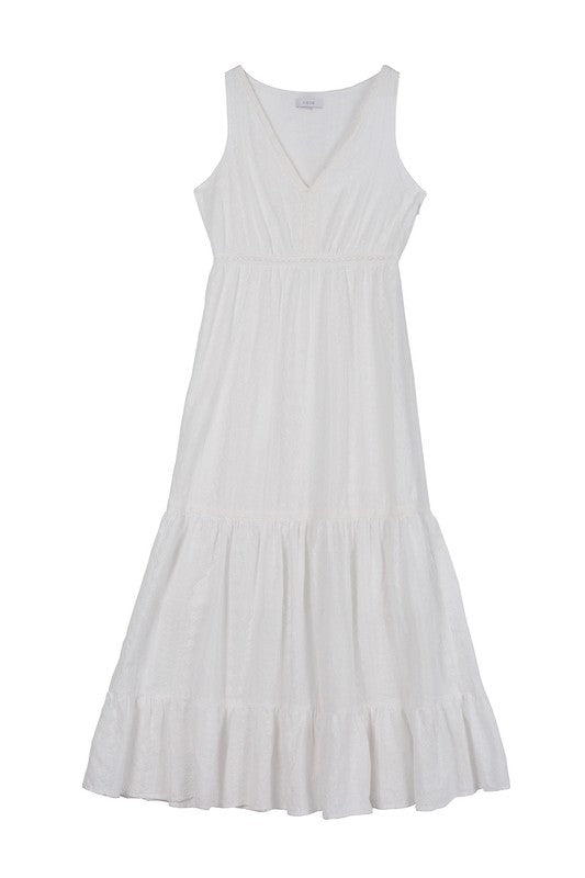 Embroidered white V neckline tiered dress*Embroidered white V neckline tiered dress*Pattern type : solid (embroidered fabric)*Neck line : V neck*Sleeve length : sleeveless*Stretch : no stretch*Sheer : lined