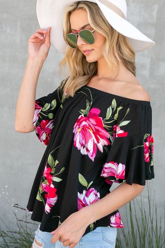 FLORAL OFF SHOULDER TOPFLORAL PRINT JERSEY ELASTICIZED OFF SHOULDER TOP- Floral off shoulder top- Elasticized off shoulder neckline- Ruffle short sleeves- Loose fit- Allover floral print j