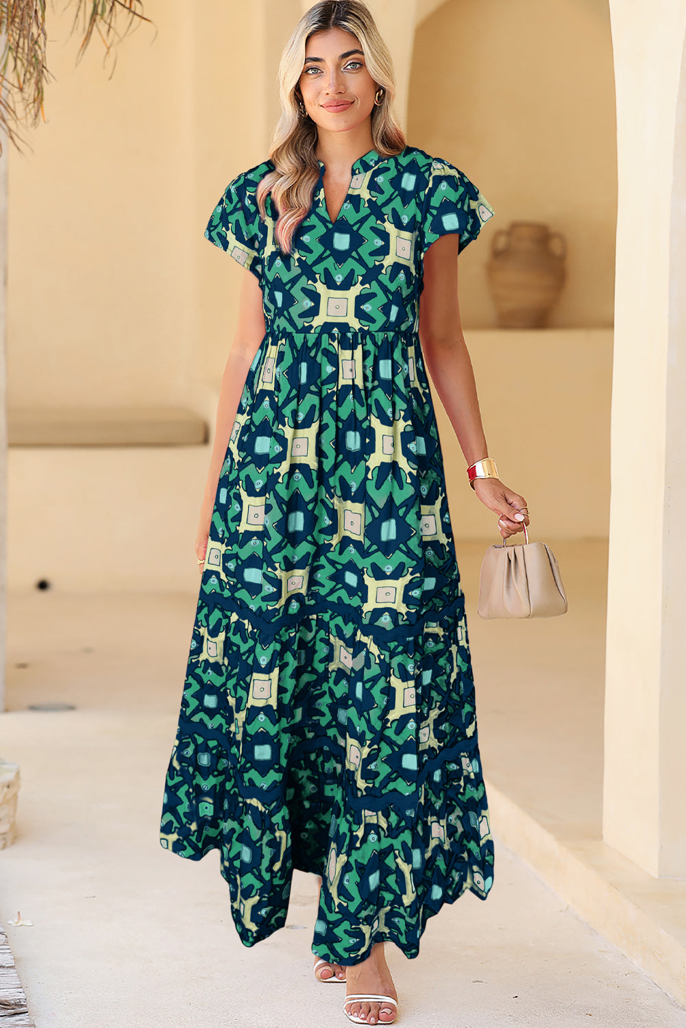 Sea Green Abstract Print Pleated Flounce Sleeve Maxi DressMaterial:100%Polyester



		The maxi dress is a stunning and vibrant dress featuring an abstract print that adds a pop of color and visual interest to your outfit.