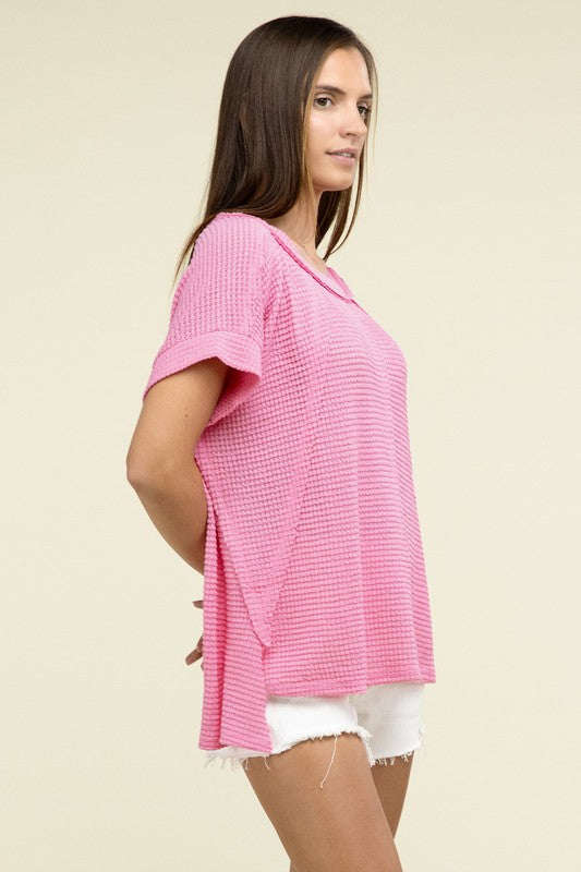 Brushed Waffle Exposed-Seam Short Sleeve TopElevate your casual wardrobe with this Brushed Waffle Top, featuring side slits, exposed seam details, and a stylish hi-low hem. Perfect for a relaxed yet trendy loo