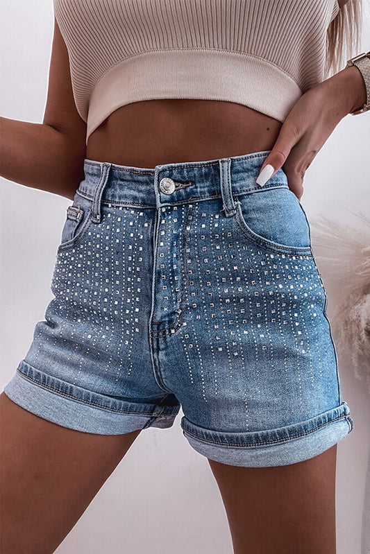 Ashleigh Blue Rhinestone Embellished Denim ShortsMaterial:55%Cotton+42%Viscose+3%Elastane

• Elevate your summer style with the shorts, featuring dazzling rhinestone embellishments that catch the light for a glamo