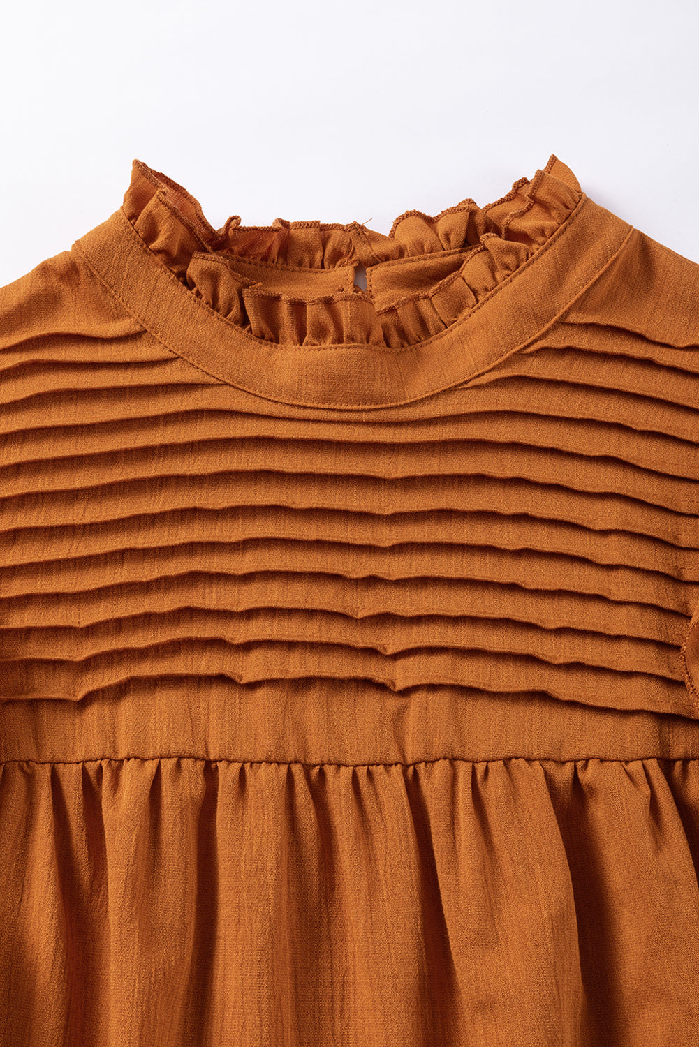 Camel Ruffle Solid Color Pleated Smocked Long Sleeve BlouseMaterial:50%Viscose+28%Polyester+22%Polyamide



		The blouse is made of high-quality fabric that is comfortable to wear and easy to maintain.
	
	
		The ruffled