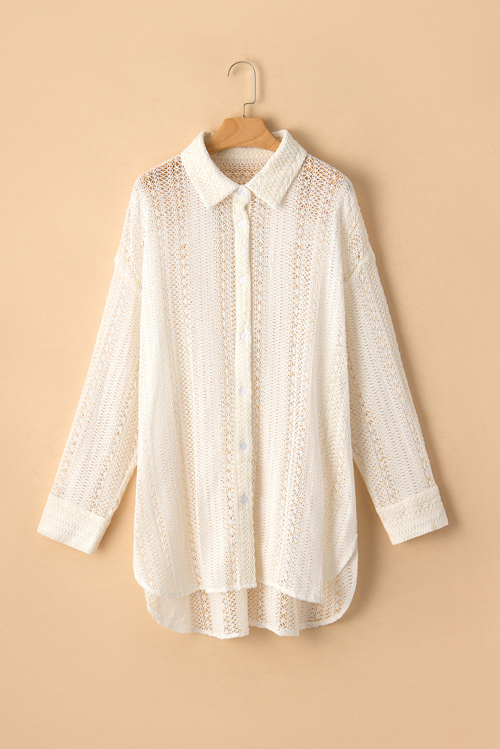 Beige Lace Crochet Collared Button Up Oversized ShirtMaterial:85%Cotton+15%Polyester

• Effortlessly elegant, the shirt exudes bohemian charm with its intricate crochet lace detailing.
• Its oversized fit offers comf