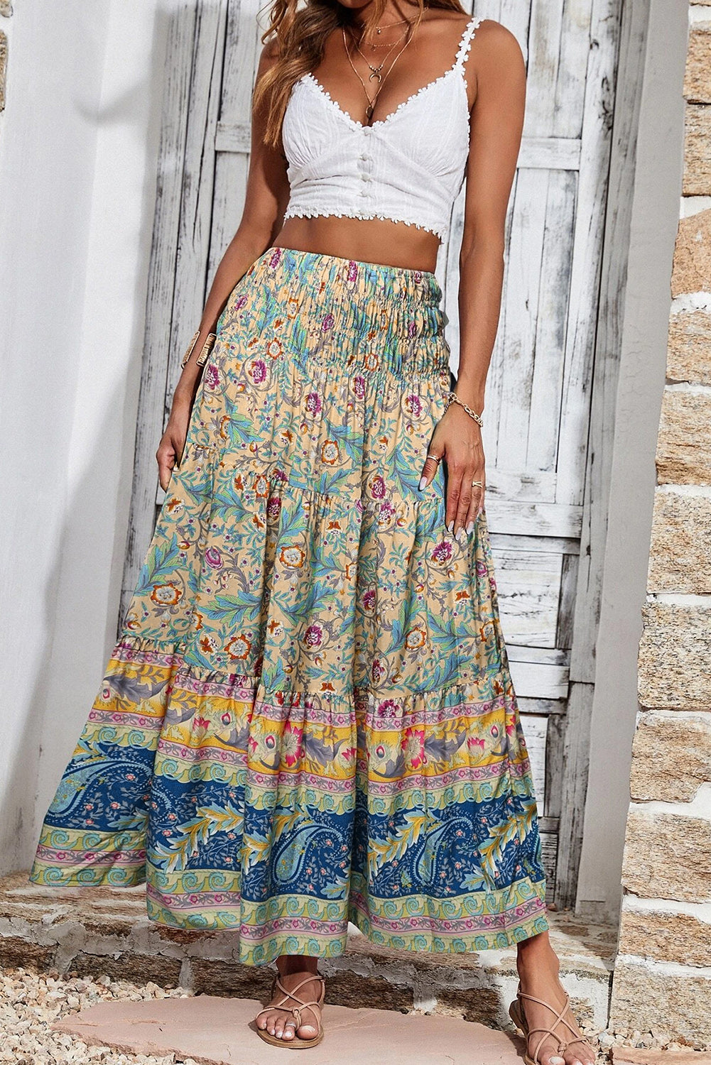 Sky Blue Boho Floral & Paisley Print Shirred Waist Long SkirtMaterial:100%Viscose

• Embrace a bohemian flair with this skirt, featuring a shirred waist that accentuates the natural curves for a flattering fit.
• The intrica