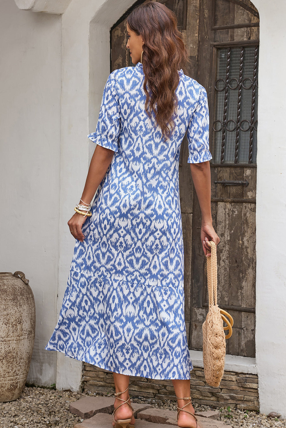 Sky Blue Geometric Print Casual V Neck Maxi DressMaterial:100%Polyester



		•Gorgeous and stylish dress in elegant blue with ruffle trim.
	
	
		•Features a split v-neck and a half-sleeve design that adds some