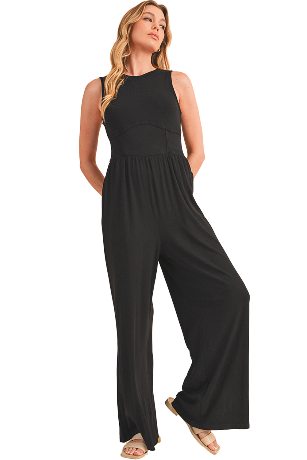 Blackish Green Sleeveless High Waist Wide Leg JumpsuitMaterial:93%Viscose+7%Elastane



		The jumpsuit features a sleeveless design, meaning it does not have sleeves and exposes the arms. 
	
	
		The jumpsuit has a 