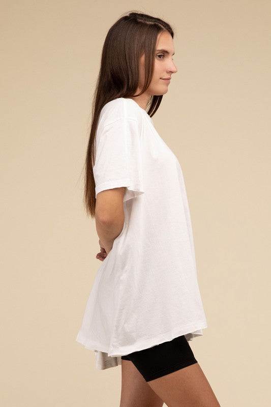 Cotton Drop Shoulder Oversized TopThe Cotton Drop Shoulder Oversized Top is a chic and comfortable addition to your wardrobe. With raw edge details adding a touch of edge, this top offers a relaxed, 