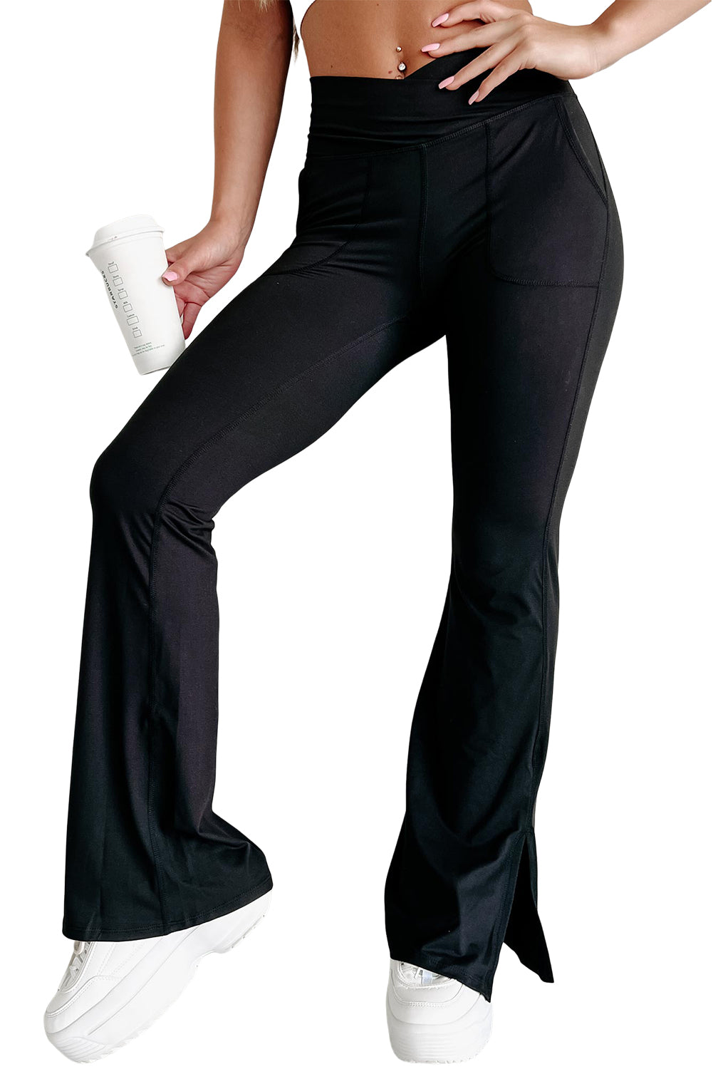 Black Cross Waist Pocketed Split Hem Flared LeggingsMaterial:75%Polyamide+25%Elastane



		Elevate your everyday look with these stylish pants made from soft, high-quality material that offers a comfortable stretch 