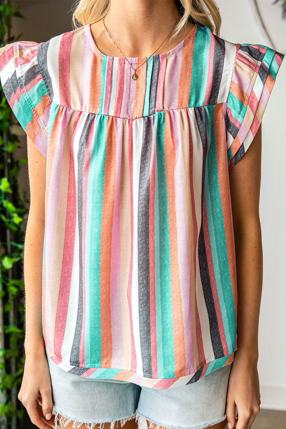 Multicolor Striped Back Button Keyhole Layered Sleeve BlouseMaterial:100%Polyester



		Vibrant and eye-catching striped print design.
	
	
		Tiered sleeves add a unique and stylish touch to the blouse.
	
	
		Pair with