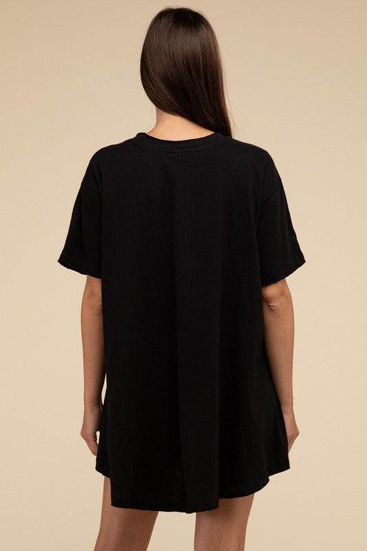 Cotton Drop Shoulder Oversized TopThe Cotton Drop Shoulder Oversized Top is a chic and comfortable addition to your wardrobe. With raw edge details adding a touch of edge, this top offers a relaxed, 