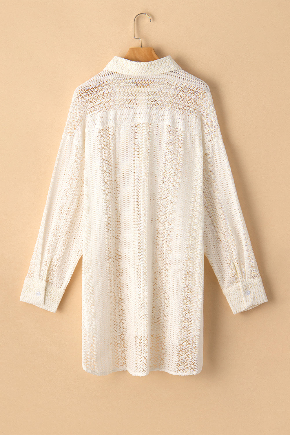 Beige Lace Crochet Collared Button Up Oversized ShirtMaterial:85%Cotton+15%Polyester

• Effortlessly elegant, the shirt exudes bohemian charm with its intricate crochet lace detailing.
• Its oversized fit offers comf