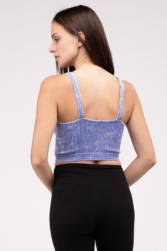 Washed Ribbed Cropped V-Neck Tank TopThe Washed Ribbed Cropped V-Neck Tank Top offers a stylish and comfortable option for your wardrobe. Made from ribbed fabric with a washed finish, it exudes a casual