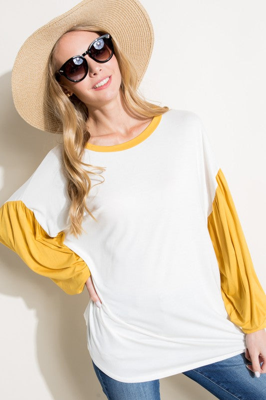 COLOR BLOCK VOLUME PUFF SLEEVE TOPSOLID JERSEY COLOR BLOCK VOLUMED PUFF LONG SLEEVE ROUND NECK TOP95% RAYON, 5% SPANDEX MADE IN USAS/M/L 2-2-2
Style: Casual
Print / Pattern: SOLID
Fit: Loose
Neck Lin