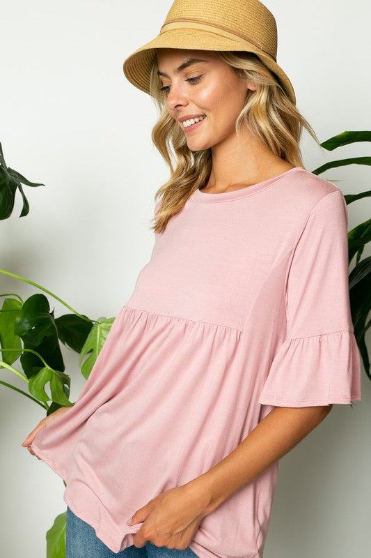 PLUS SOLID RUFFLE SLEEVE LOOSE TOPSOLID JERSEY ROUND NECK HALF RUFFLE SLEEVE LOOSE FIT PLUS TOP95% RAYON, 5% SPANDEX MADE IN USA1X/2X/3X 2-2-2
Style: Casual
Print / Pattern: SOLID
Fit: LOOSE FIT 
Nec