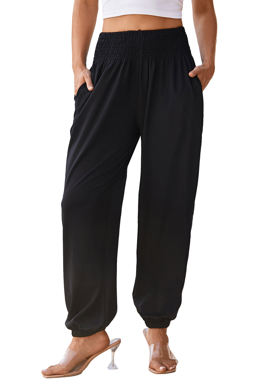 Black Pocketed Smocked High Waist JoggersMaterial:95%Polyester+5%Elastane



		These jogger pants are very cozy to wear with 95%Polyester+5%Elastane made
	
	
		The smocked design adds a stylish touch a