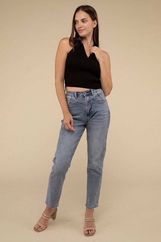 Sleeveless Collared Crop Knit TopThe Sleeveless Collared Crop Knit Top exudes timeless elegance and sophistication. Its tailored design features a classic collared neckline, adding a touch of refine