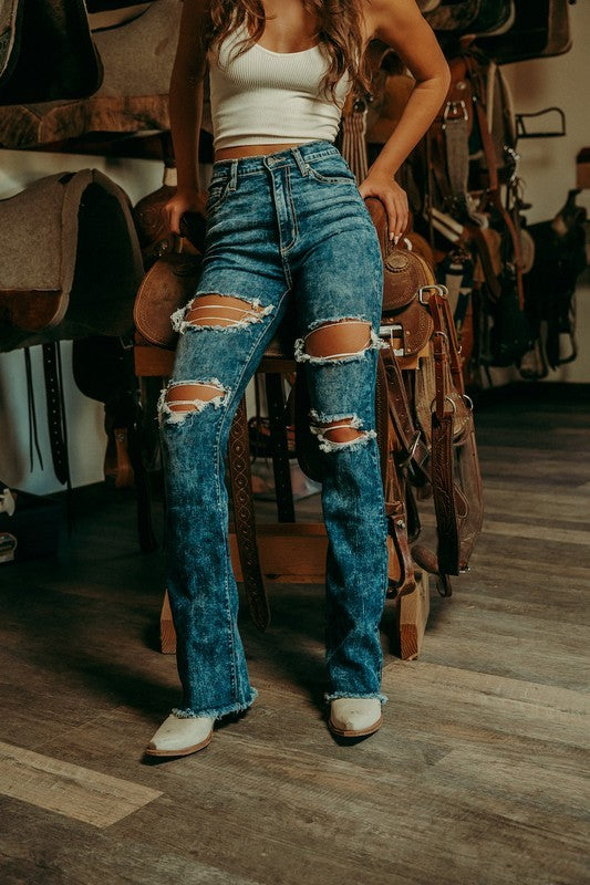 Thania Boot Cut JeanRevamp your wardrobe with the classically stylish Tania Boot Cut Jean! Boasting a front button and zipper closure, this classic jean has all the features you need. F