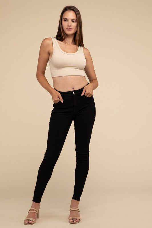 Ribbed Seamless Crop TopElevate your summer essentials with our Ribbed Seamless Crop Top, a versatile piece perfect for layering or wearing solo. Crafted with comfort in mind, it boasts a f