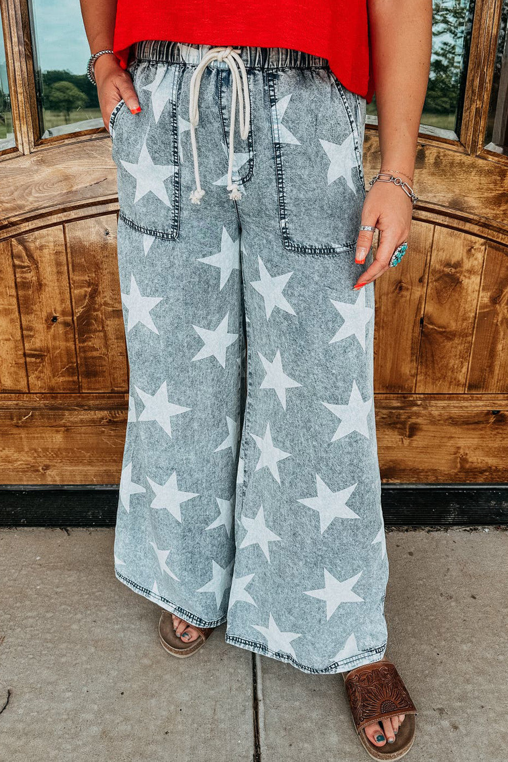 Light Blue Star Print Light Wash Drawstring High Waist Wide Leg JeansMaterial:82%Cotton+10%Polyester+8%Viscose

• Elevate your casual look with these light blue star print high waist jeans, featuring a trendy wide leg design for a ch