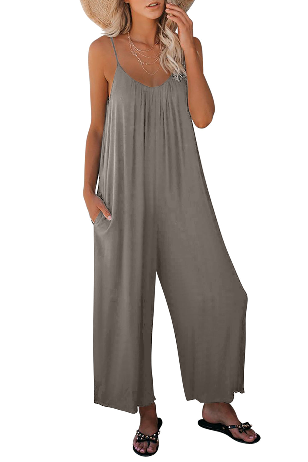 Grey Casual Spaghetti Straps Wide Leg Pocketed JumpsuitsMaterial:Knit


	


		Sleeveless spaghetti straps allow you to expose a large area of skin, making you cooler in summer
	
	
		The wide-leg version is very sty