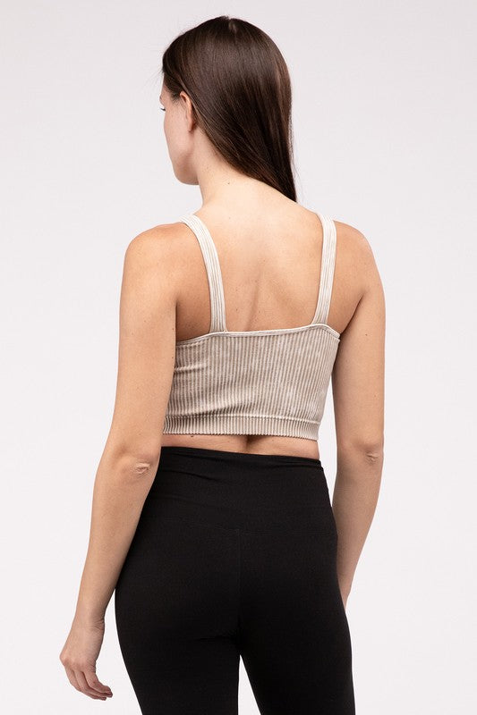 Washed Ribbed Cropped V-Neck Tank TopThe Washed Ribbed Cropped V-Neck Tank Top offers a stylish and comfortable option for your wardrobe. Made from ribbed fabric with a washed finish, it exudes a casual