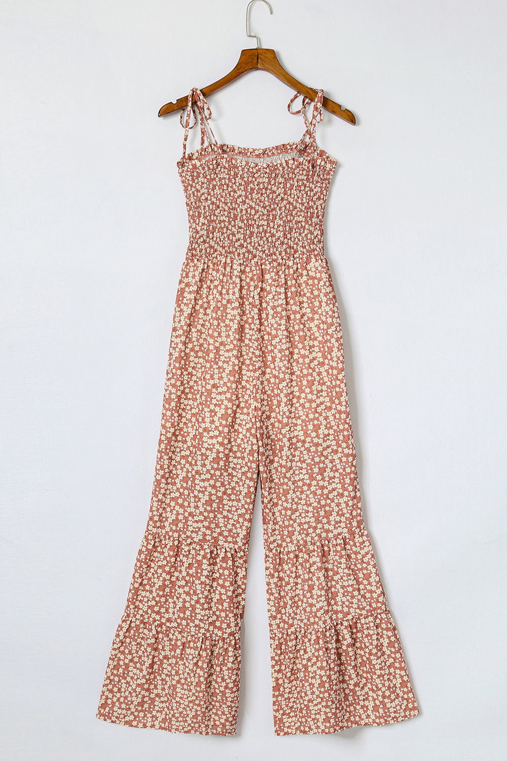 Khaki Floral Spaghetti Straps Smocked Bodice Wide Leg JumpsuitMaterial:100%Polyester



		Smoked bodice design highlights women’s
sexy body shapes.
	
	
	
		Floral jumpsuit with the wide leg is very
textured and fashiona